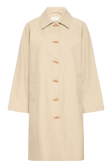 Gabardina impermeable, Ihestava Ja - Imagen 1