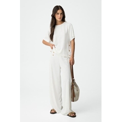 Pantalón fluido blanco de pierna ancha con aplicación de botones, Aethos - Imagen 1